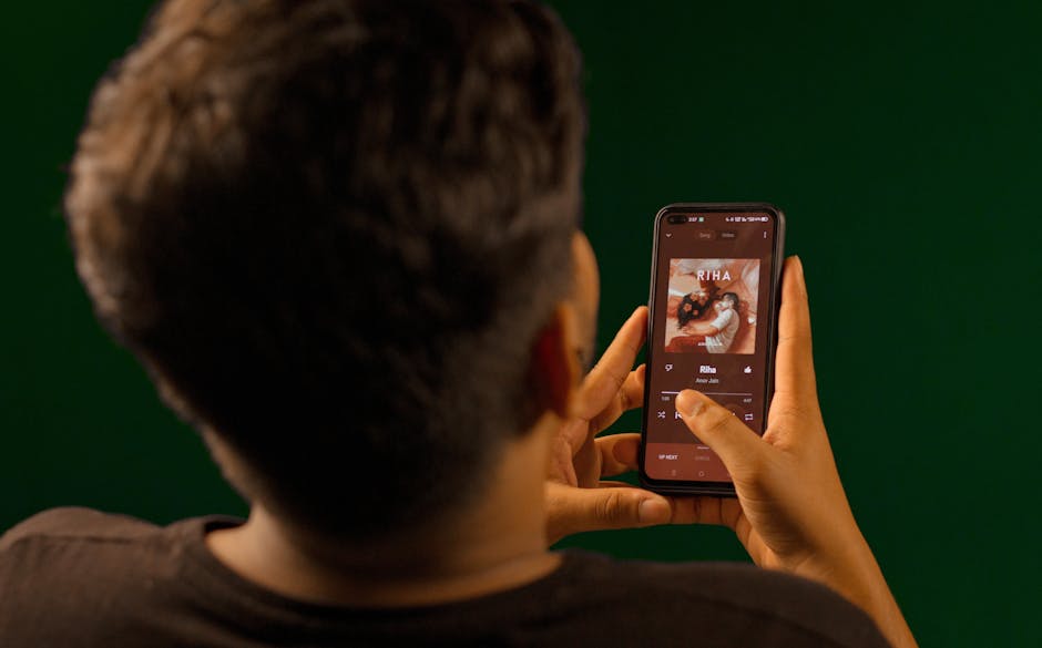 A phone showing a music streaming playlist