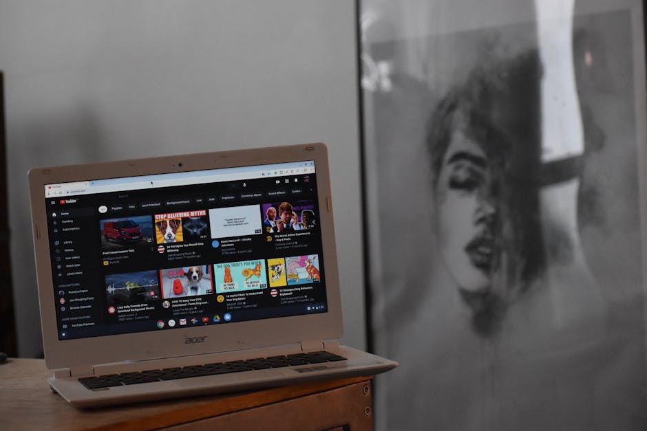 Person watching a video tutorial on a laptop