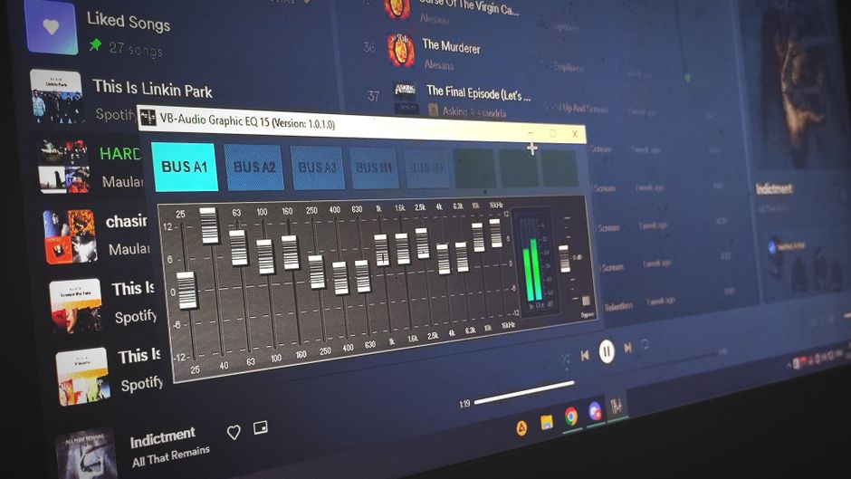 Audio editing software showing EQ and plugin windows on a studio monitor