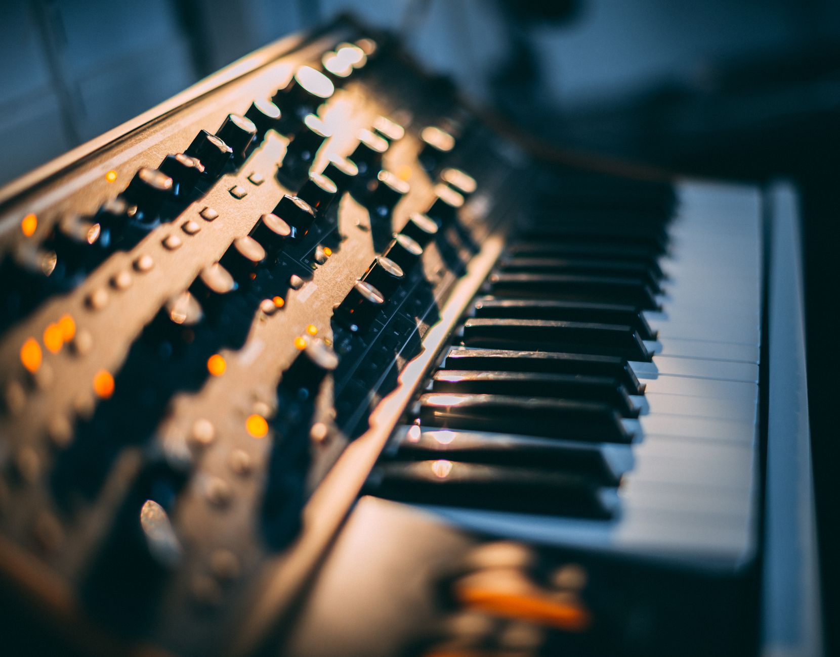 Close-up of electronic keyboard keys in a music studio